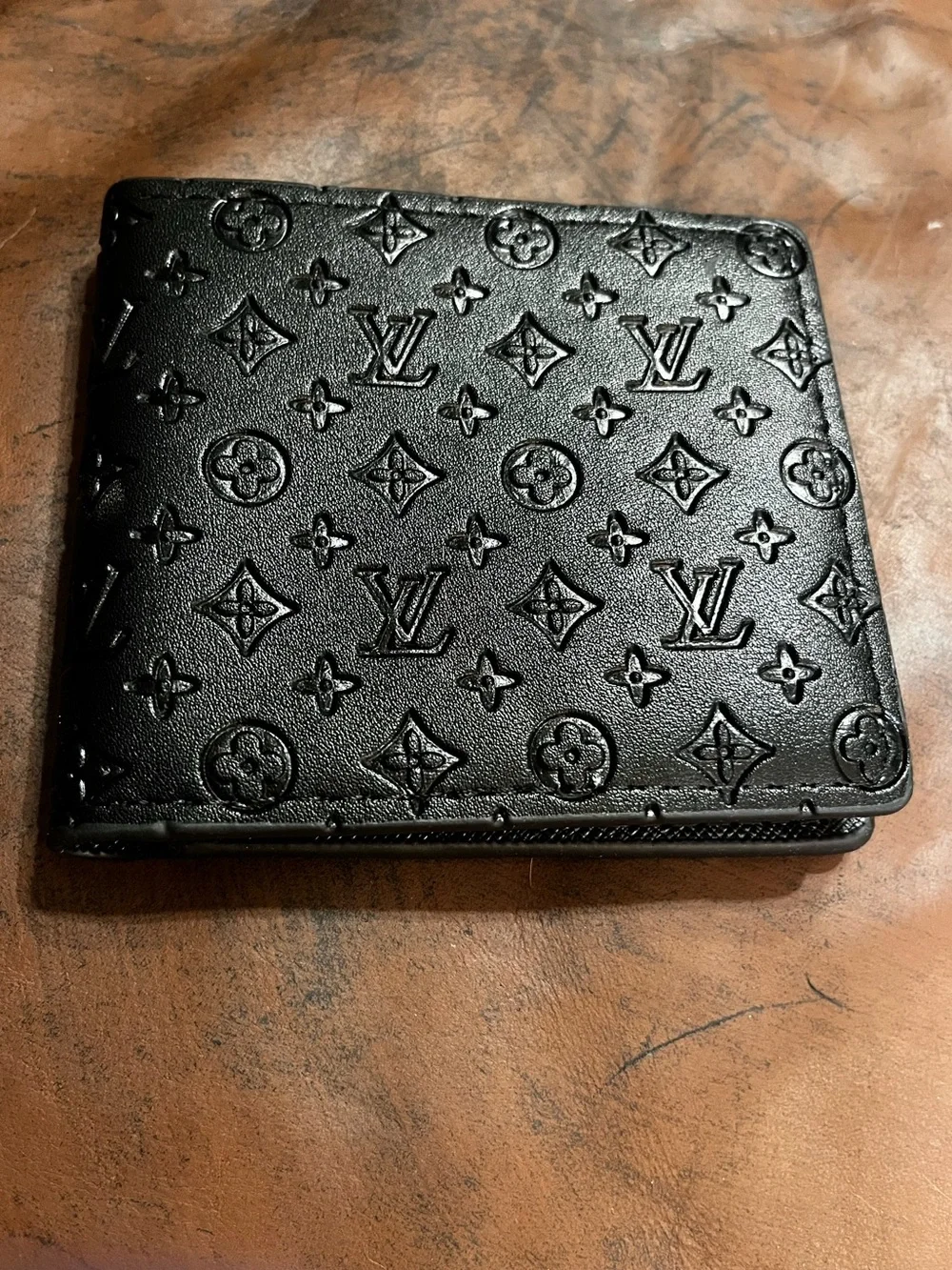 ⚫️ Louis. Vuitton. Embossed Letter Monogram Black Bi-Fold Wallet